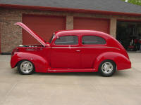 38 Ford sedan with a Full house Flathead, Lincoln Zephyr gears and a Halibrand quick change.