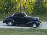 38 Chevy Coupe.  This one had a very scary front end and scarier brakes.  After picking the car up, he called back and said he took his hands off the wheel at 100 MPH and that it was straight and stable.