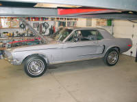 69 Ford Mustang. A bit of tweaking on the carburetor, a little tuning, and some electrical.