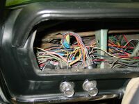 Picture of brand new wiring harness installed by another local shop.  The car came in with electrical issues,  GO FIGURE!!!  Check out all those butt splices.  This is what I call no man's land.  if you so much as touch one thing, 3 other gremlins appear.